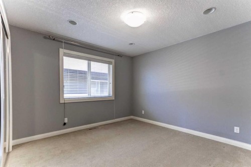 406 Silverado Boulevard Sw, Calgary, AB - Indoor Photo Showing Other Room