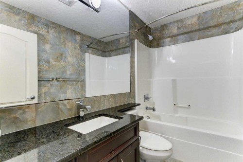 406 Silverado Boulevard Sw, Calgary, AB - Indoor Photo Showing Bathroom