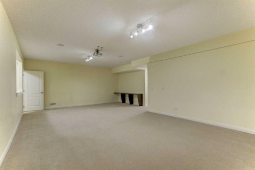 406 Silverado Boulevard Sw, Calgary, AB - Indoor Photo Showing Other Room