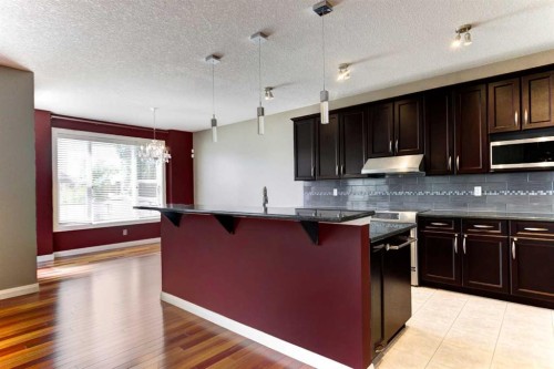 406 Silverado Boulevard Sw, Calgary, AB - Indoor Photo Showing Kitchen