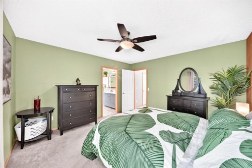 206 Panamount Grove Nw, Calgary, AB - Indoor Photo Showing Bedroom