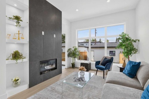 3613 2 Street Nw, Calgary, AB - Indoor Photo Showing Living Room With Fireplace