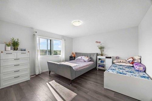 87 Harvest Grove Common Ne, Calgary, AB - Indoor Photo Showing Bedroom