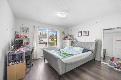 87 Harvest Grove Common Ne, Calgary, AB - Indoor Photo Showing Bedroom
