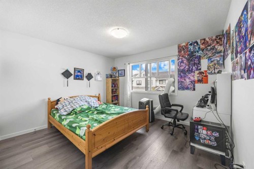 87 Harvest Grove Common Ne, Calgary, AB - Indoor Photo Showing Bedroom