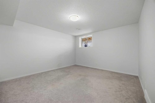 87 Harvest Grove Common Ne, Calgary, AB - Indoor Photo Showing Other Room
