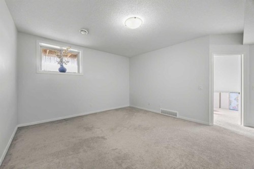 87 Harvest Grove Common Ne, Calgary, AB - Indoor Photo Showing Other Room