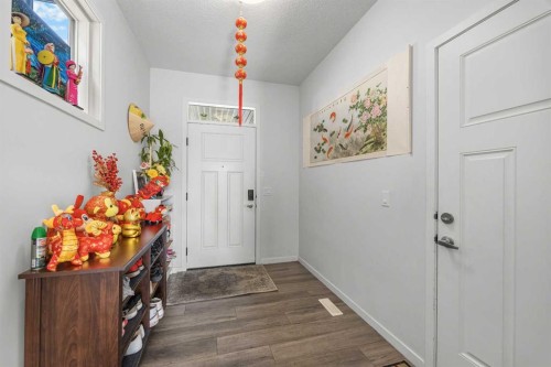 87 Harvest Grove Common Ne, Calgary, AB - Indoor Photo Showing Other Room