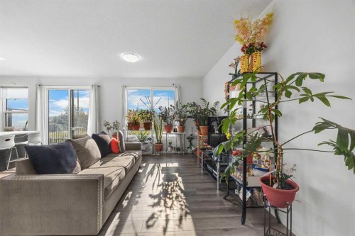 87 Harvest Grove Common Ne, Calgary, AB - Indoor Photo Showing Living Room