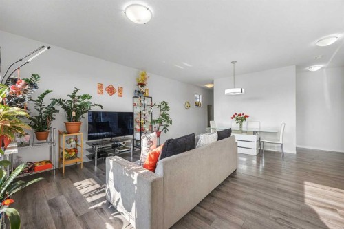 87 Harvest Grove Common Ne, Calgary, AB - Indoor Photo Showing Living Room