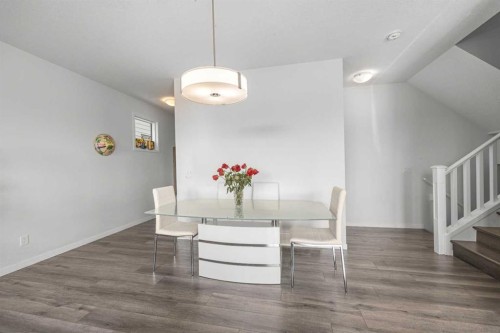 87 Harvest Grove Common Ne, Calgary, AB - Indoor Photo Showing Dining Room
