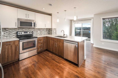 38 Nolanfield Road Nw, Calgary, AB - Indoor Photo Showing Kitchen With Stainless Steel Kitchen With Upgraded Kitchen