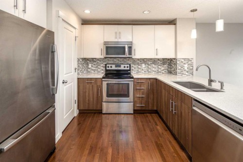 38 Nolanfield Road Nw, Calgary, AB - Indoor Photo Showing Kitchen With Stainless Steel Kitchen With Double Sink With Upgraded Kitchen