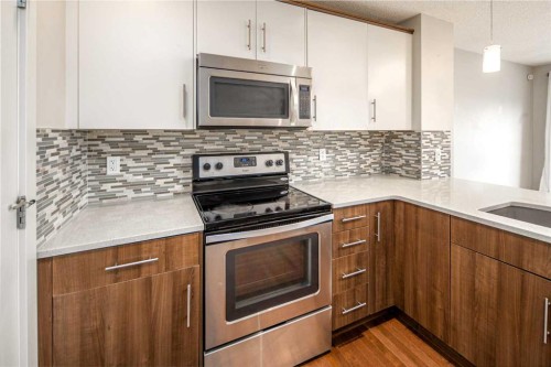 38 Nolanfield Road Nw, Calgary, AB - Indoor Photo Showing Kitchen With Stainless Steel Kitchen With Upgraded Kitchen