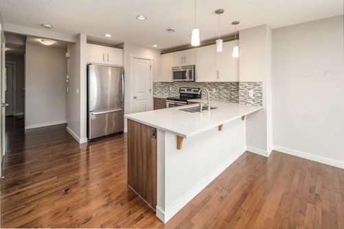 38 Nolanfield Road Nw, Calgary, AB - Indoor Photo Showing Kitchen With Stainless Steel Kitchen With Upgraded Kitchen
