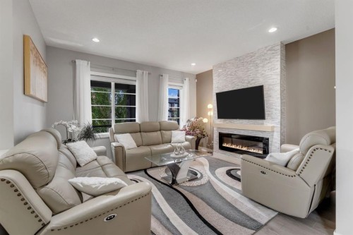 160 Cornerstone Avenue Ne, Calgary, AB - Indoor Photo Showing Living Room With Fireplace