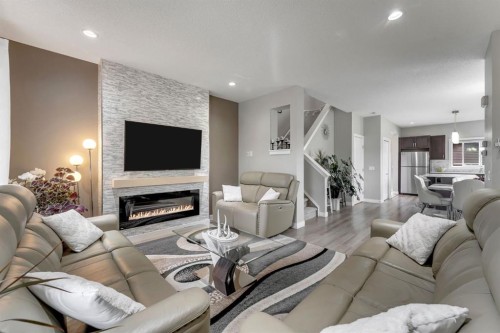 160 Cornerstone Avenue Ne, Calgary, AB - Indoor Photo Showing Living Room With Fireplace