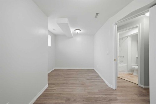 7 Falshire Close Ne, Calgary, AB - Indoor Photo Showing Other Room