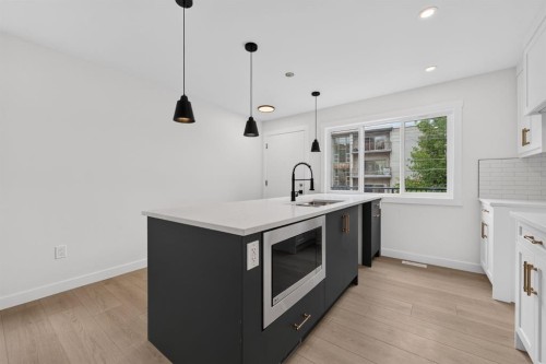 2024 12 Avenue Sw, Calgary, AB - Indoor Photo Showing Kitchen With Upgraded Kitchen