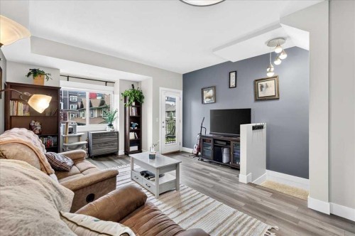 1016-121 Copperpond Common Se, Calgary, AB - Indoor Photo Showing Living Room