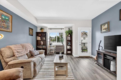 1016-121 Copperpond Common Se, Calgary, AB - Indoor Photo Showing Living Room