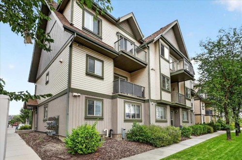 1016-121 Copperpond Common Se, Calgary, AB - Outdoor With Balcony With Facade