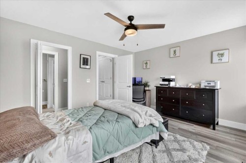1016-121 Copperpond Common Se, Calgary, AB - Indoor Photo Showing Bedroom