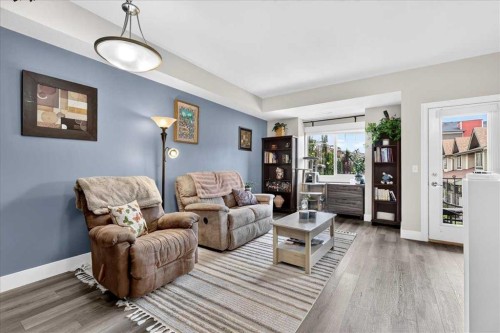 1016-121 Copperpond Common Se, Calgary, AB - Indoor Photo Showing Living Room