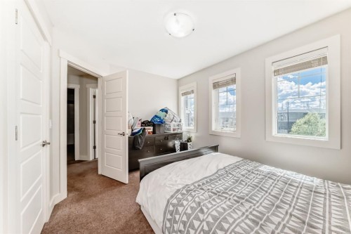40 Cooperstown Place Sw, Airdrie, AB - Indoor Photo Showing Bedroom