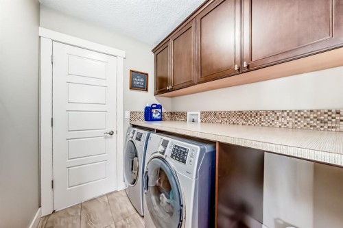 40 Cooperstown Place Sw, Airdrie, AB - Indoor Photo Showing Laundry Room