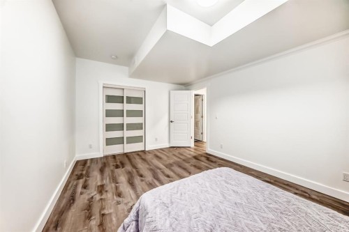 40 Cooperstown Place Sw, Airdrie, AB - Indoor Photo Showing Bedroom