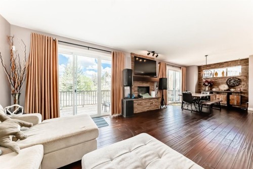 40 Cooperstown Place Sw, Airdrie, AB - Indoor Photo Showing Living Room