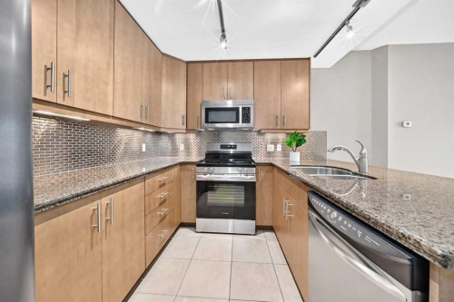 2403-210 15 Avenue Se, Calgary, AB - Indoor Photo Showing Kitchen With Double Sink