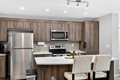 30 Yorkville Boulevard Sw, Calgary, AB - Indoor Photo Showing Kitchen With Stainless Steel Kitchen With Upgraded Kitchen