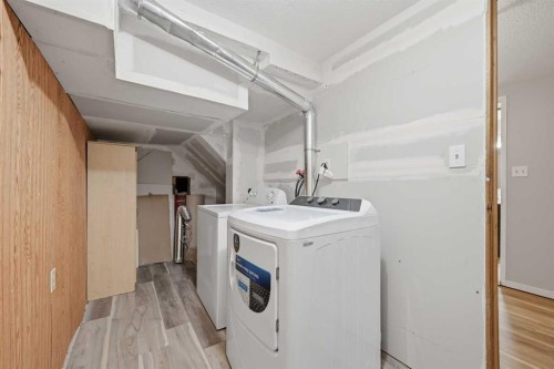 228 Berwick Drive Nw, Calgary, AB - Indoor Photo Showing Laundry Room