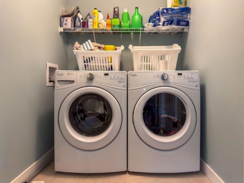 122 Midtown Boulevard Sw, Airdrie, AB - Indoor Photo Showing Laundry Room