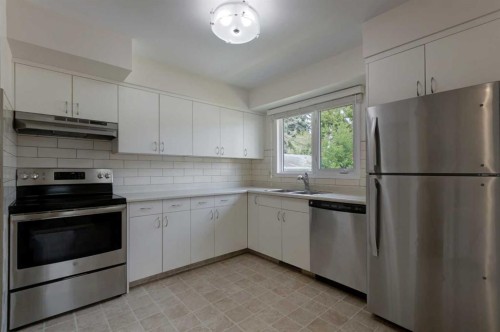 328 86 Avenue Se, Calgary, AB - Indoor Photo Showing Kitchen With Stainless Steel Kitchen With Double Sink