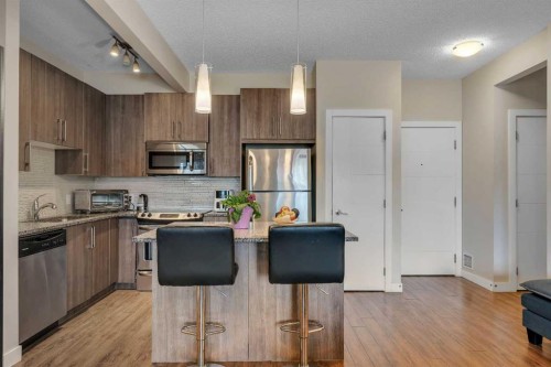 108-8 Sage Hill Terrace Nw, Calgary, AB - Indoor Photo Showing Kitchen With Stainless Steel Kitchen With Upgraded Kitchen
