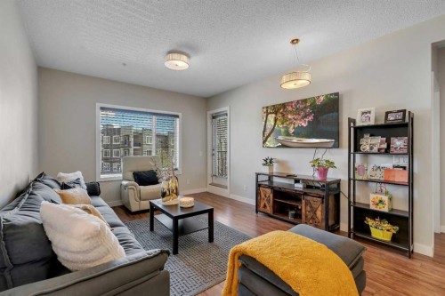 108-8 Sage Hill Terrace Nw, Calgary, AB - Indoor Photo Showing Living Room