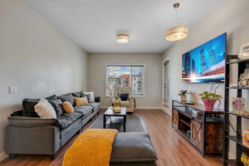 108-8 Sage Hill Terrace Nw, Calgary, AB - Indoor Photo Showing Living Room