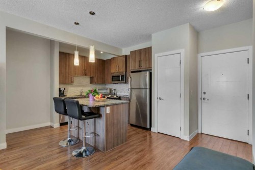 108-8 Sage Hill Terrace Nw, Calgary, AB - Indoor Photo Showing Kitchen With Stainless Steel Kitchen