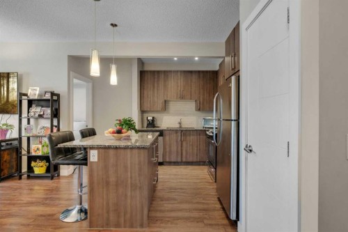 108-8 Sage Hill Terrace Nw, Calgary, AB - Indoor Photo Showing Kitchen With Stainless Steel Kitchen With Upgraded Kitchen