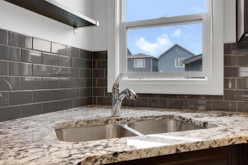 56 Corner Meadows Park Ne, Calgary, AB - Indoor Photo Showing Kitchen With Double Sink