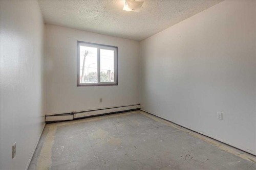 205-4904 54 Street, Red Deer, AB - Indoor Photo Showing Other Room