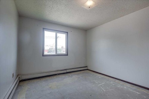 205-4904 54 Street, Red Deer, AB - Indoor Photo Showing Other Room