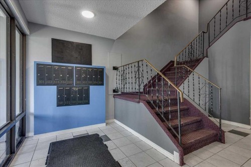 205-4904 54 Street, Red Deer, AB - Indoor Photo Showing Other Room