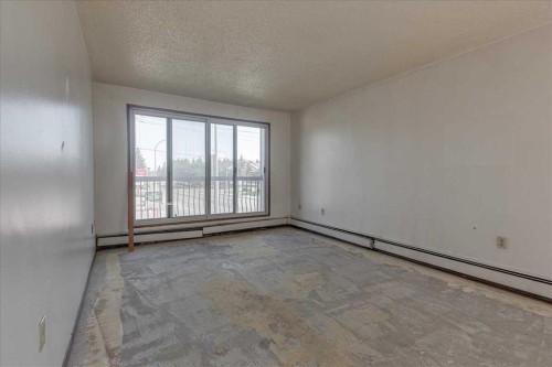 205-4904 54 Street, Red Deer, AB - Indoor Photo Showing Other Room