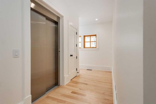 212 Hawk'S Landing Rise, Priddis Greens, AB - Indoor Photo Showing Other Room
