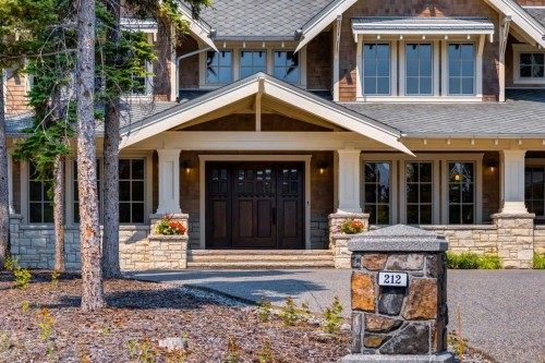 212 Hawk'S Landing Rise, Priddis Greens, AB - Outdoor With Facade