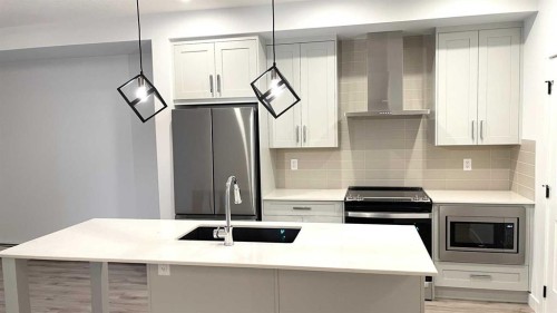 115-40 Sage Hill Nw, Calgary, AB - Indoor Photo Showing Kitchen With Upgraded Kitchen